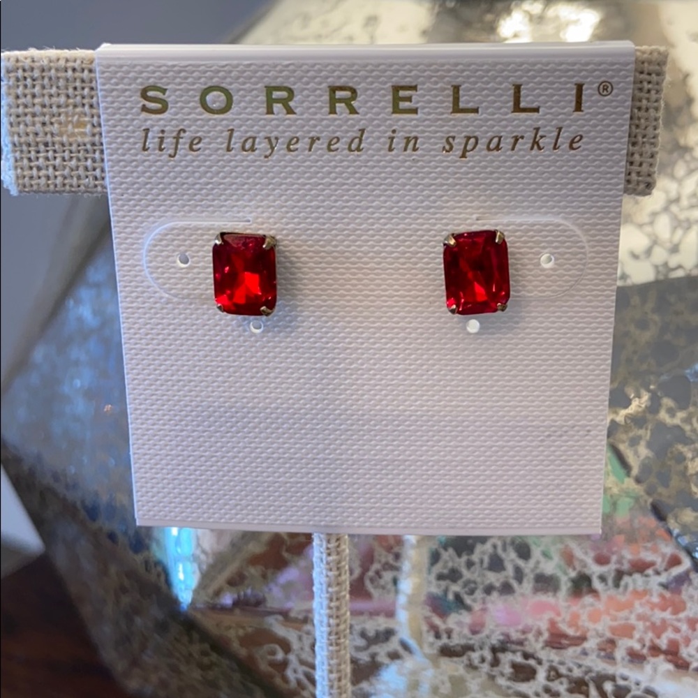 Sansa red emerald cut studs